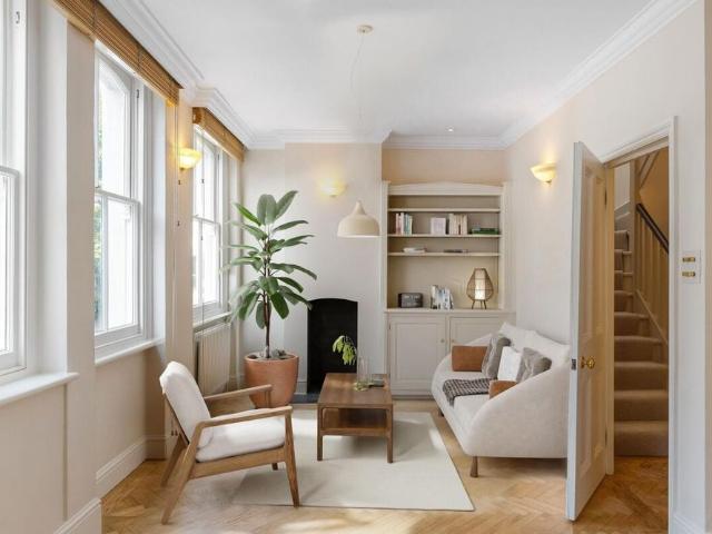 A four bedroom house with a large roof terrace and two additional balconies, located in a quiet cul de sac in South Kensington SW7