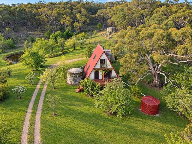 A FRAME PERFECT HAVEN ON 3 PRIVATE ACRES