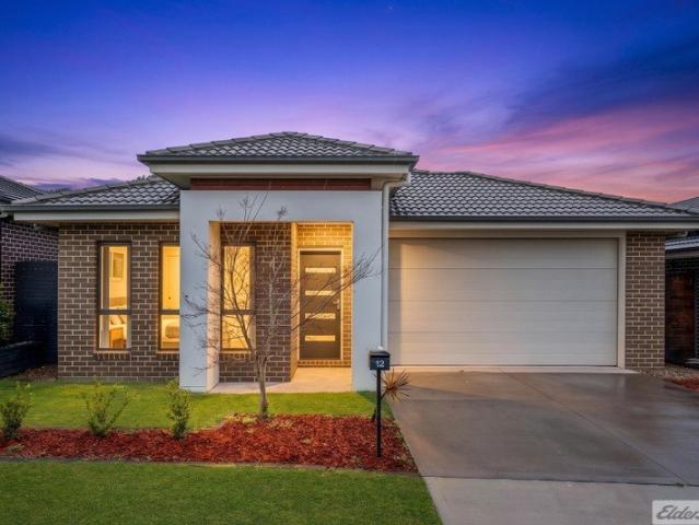 A Fresh, Family Friendly Home in a Quiet Oran Park Setting