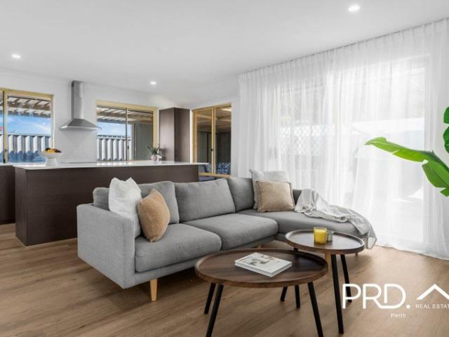A Beautifully Renovated Family Home with Poolside Living