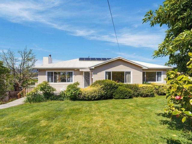 A Generous Family Home with Views, Gardens & Future Development Potential STCA