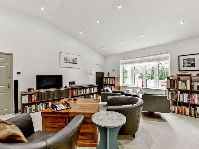 A generously proportioned family house in the heart of Bray village with extensive grounds and wonderful views over farmland