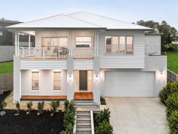 A Grand Entertainer with Sweeping Views and Park Behind