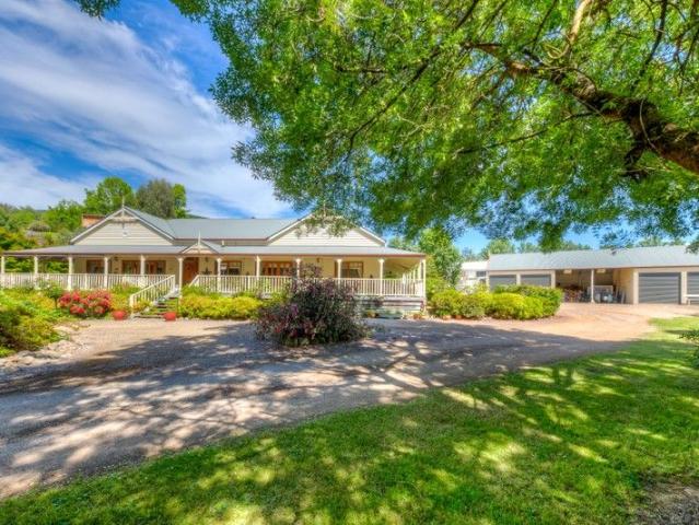 A Grand Residence on 2.5 Acres Space, Privacy and Timeless Country Elegance