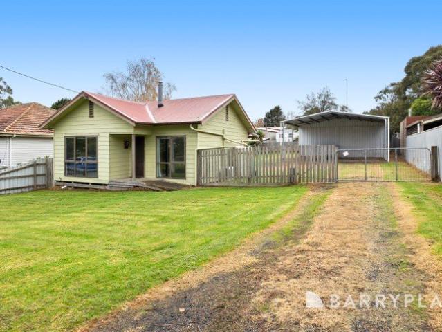 A Great First Home with a Shed Worth Bragging About