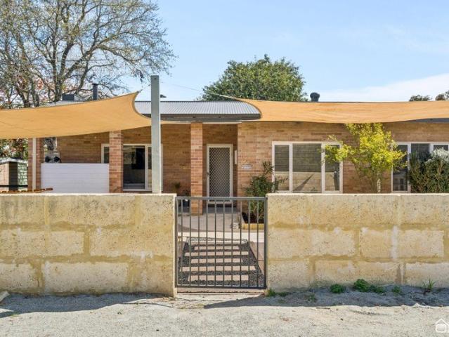 A GREAT PLACE TO LIVE ON AN IMPRESSIVE QUARTER ACRE OF LAND