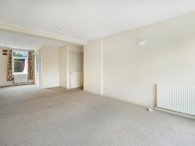 A ground floor two bedroom apartment with off street parking, garage and communal gardens, ideally located close to the Cambridge science park, Cambridge North train station and access to the A14