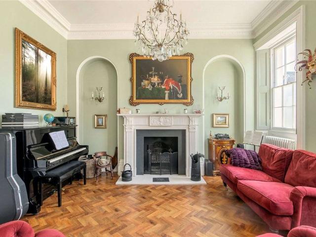 A handsome Grade II listed Georgian house offering 4,720 sq ft of impeccable accommodation
