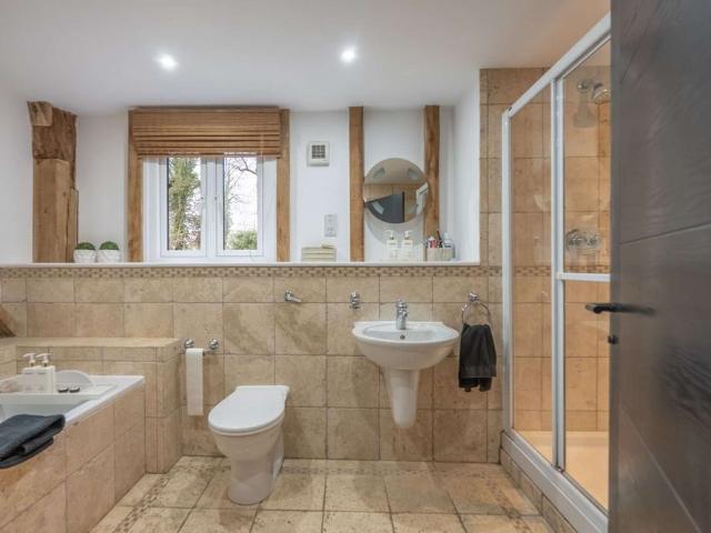 A high specification four bedroom Barn conversion with additional one bedroom apartment
