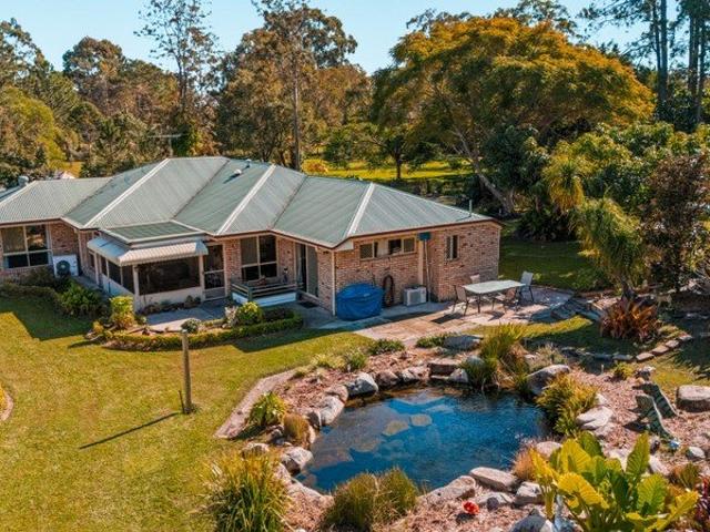 A Hidden Green Haven with Space, Comfort and Possibility!
