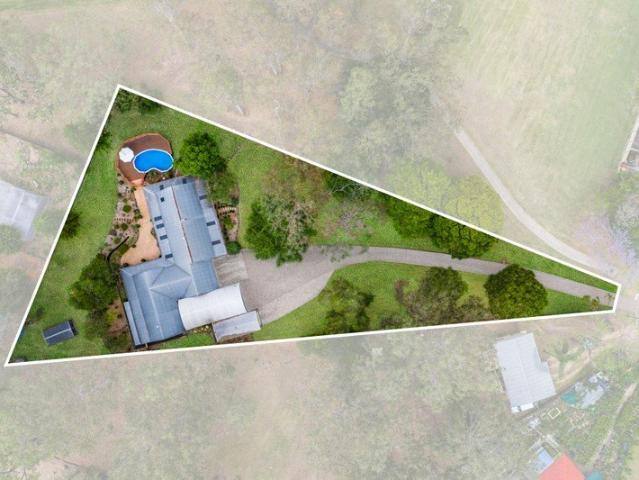 A HIDDEN OASIS WITH GUEST HOUSE OWNER'S HAVE PURCHASED THEIR NEXT HOME