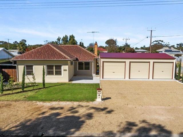 A Hidden Surprise Fully Renovated with Space, Style & Exceptional Shedding!