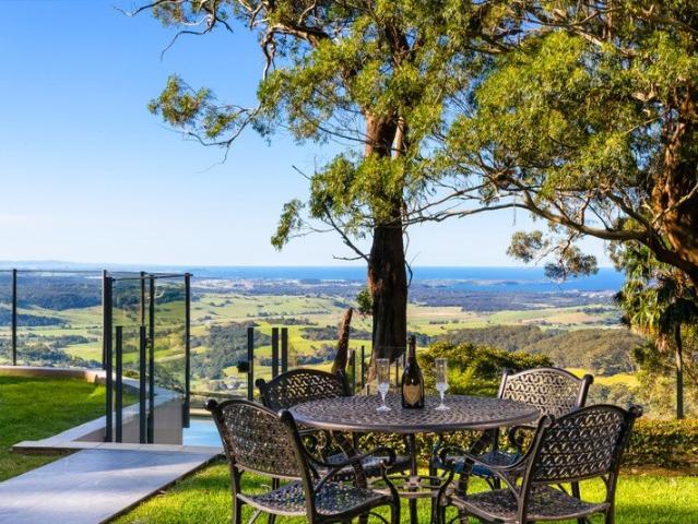 A Hilltop One Acre Haven offering Expansive Living, Complete Privacy and Panoramic Vistas