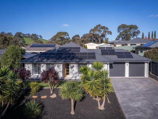A Hills home for big toys, little feet and a life with room to move…