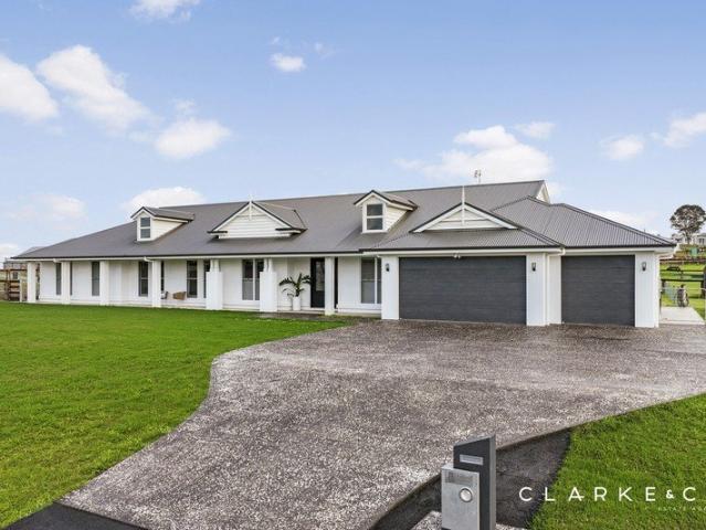 A HOME OF EXCEPTIONAL SCALE AND LUXURY!