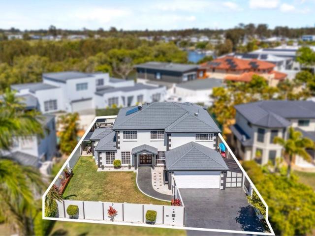 A Home of Substance, Space & Quality Exceptional Family Living Near the Broadwater