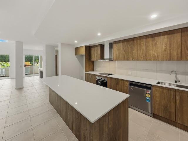 A HOME WITH A DIFFERENCE! UNIQUE DESIGN, GENEROUS SPACE & BEAUTIFUL OUTLOOKS!