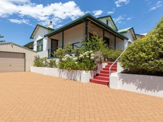 A Home with Heart, History & Harbour Views