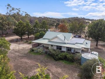 A HOME WITH POTENTIAL ON ACRES IN LEXTON