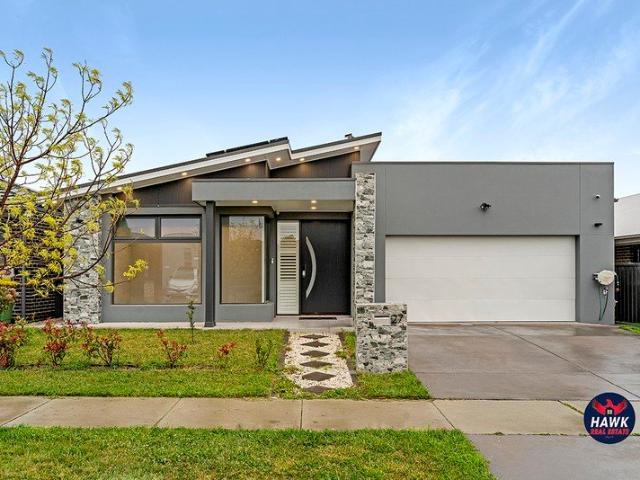 A Home to Impress, A Lifestyle to Love Four Bedrooms, Designer Finishes & Exceptional Outdoor Entertaining
