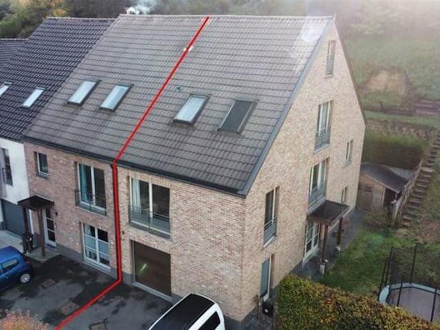 A house with office space or a bedroom on the ground floor