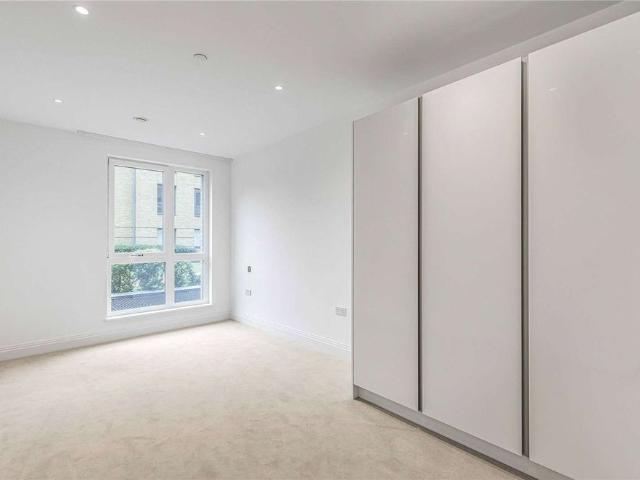 A luxury ground floor one bedroom apartment in the prestigious Teddington Riverside development