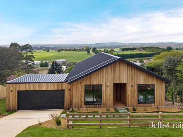 A landmark new residence opposite Wombat Hill Botanic Gardens