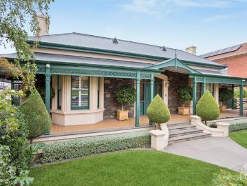 A landmark bluestone residence on 3 titles in notable dress circle position, sited on important land holding of 1363 sqm approx