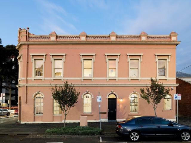 A Landmark Carlton Corner Residence with Victorian Grandeur & Endless Possibility