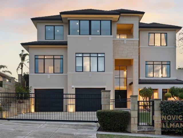 A LANDMARK FAMILY RESIDENCE WITH SWEEPING RIVER & CITY VIEWS