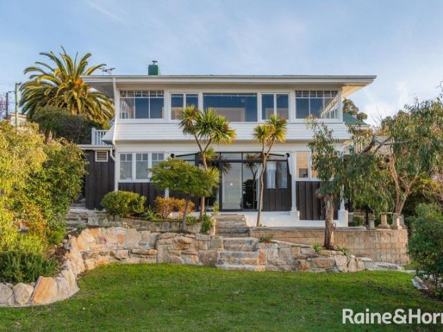 A Landmark Kingston Beach Estate Held by Just Two Families Since the 1930s