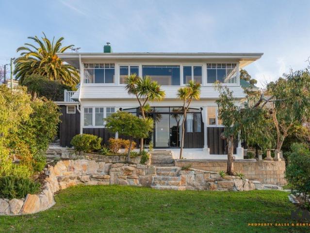 A Landmark Kingston Beach Estate Held by Just Two Families Since the 1930s
