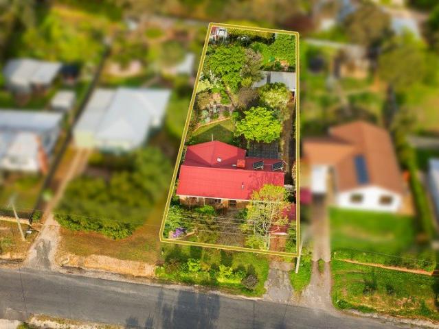 A Late 1970s Brick Home with a Garden to Wander