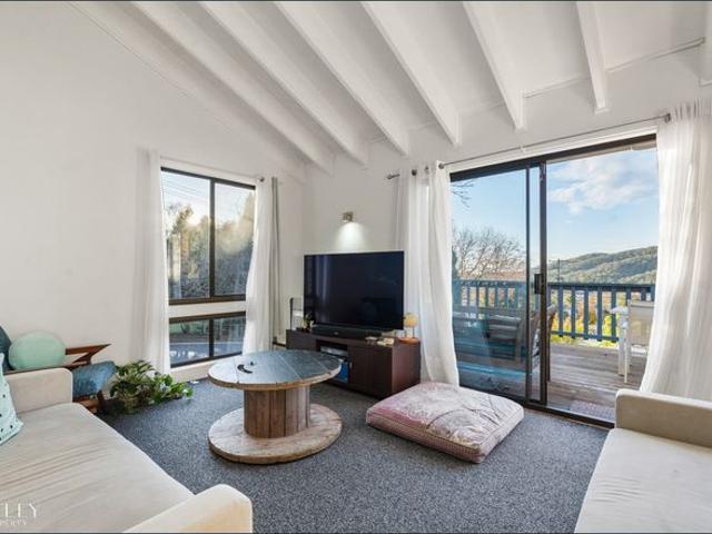 A Light Filled Family Retreat on Prestigious Mount Gibraltar