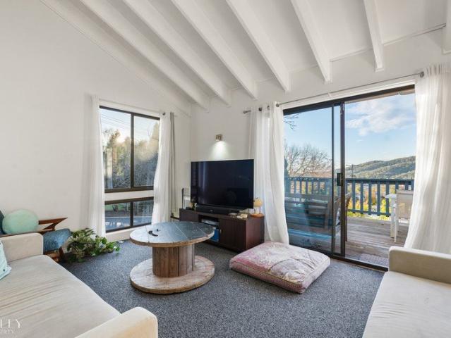 A Light Filled Family Retreat on Prestigious Mount Gibraltar