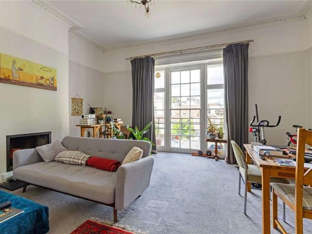 A light & well balanced apartment forming part of this attractive Grade II Listed Georgian building nestled within the heart of Clifton Village, with private roof terrace & single garage