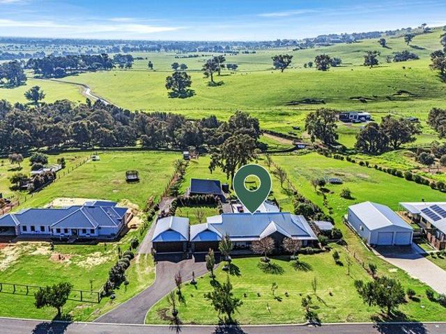 A lifestyle 1.25 acreage that feels like 100