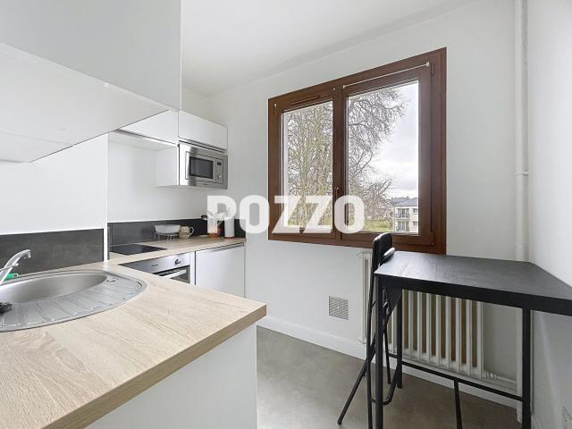A LOUER: APPARTEMENT MEUBLE 25 M2 CAVE PARKING MONDEVILLE CHAUFFAGE INCLUS