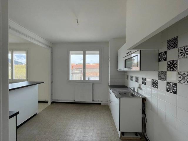A LOUER P4 PROCHE CENTRE VILLE