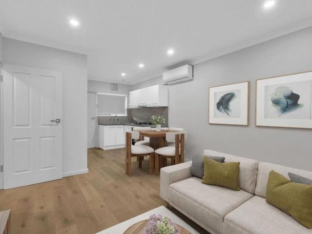 A Lovely Renovated 2 Bedroom Ground Floor Unit with Single Lock Up Garage Ready to Call Home!