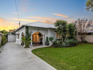 A park fronted Spanish Mission Bungalow with high quality Art Deco features
