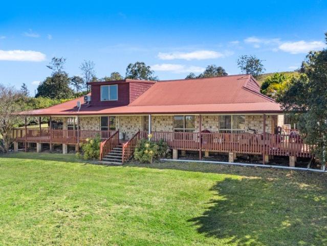 A Peaceful Acreage Escape with Rural Views & Exceptional Family Living