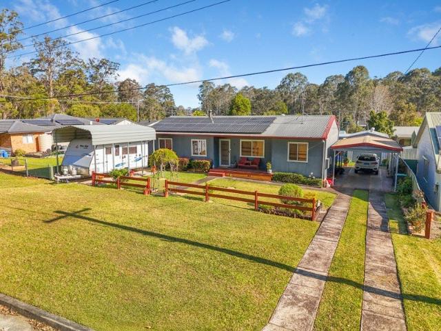 A Peaceful Village Lifestyle Awaits at this Much Loved Family Home