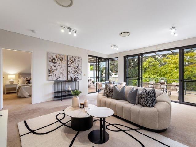 A penthouse made for living indoors and out, with village life reached on foot