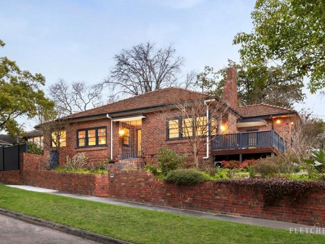 A picturesque park vista in a prized family pocket