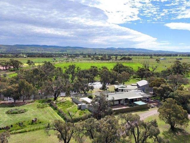 A Picturesque Rural Oasis on 12.2 Acres