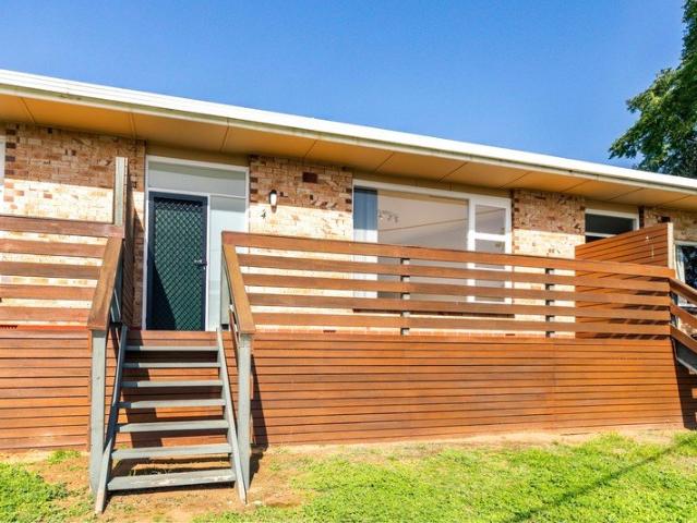A polished Hills escape where low maintenance living reaches new heights