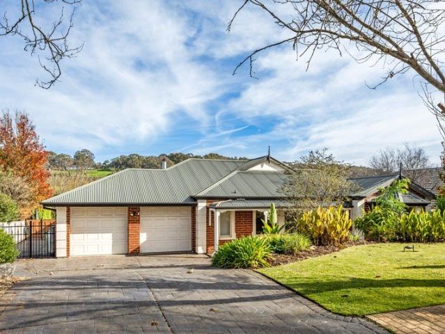 A Polished Hills Home With Room To Entertain, Retreat And Play