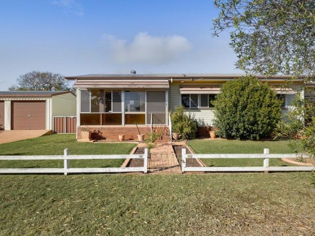 A Practical Newtown Home with Plenty of Potential