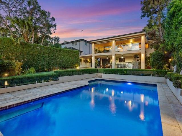 A premier family sanctuary, sprawling landscaped grounds, sunlit living and the ultimate bayside lifestyle